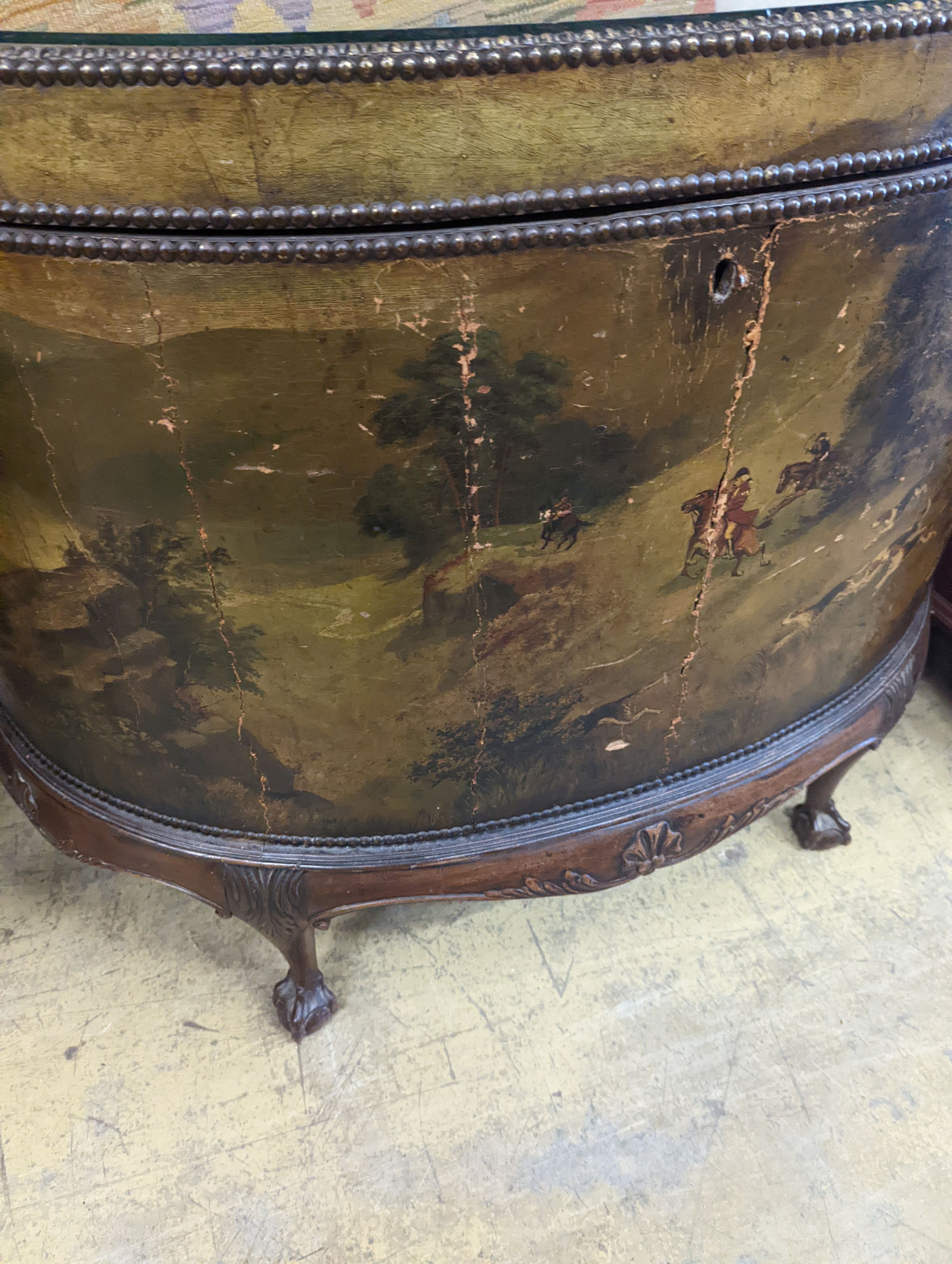 An early 20th century leather covered mahogany D shaped hinged top coffer painted with hunting scenes, length 114cm, depth 53cm, height 91cm